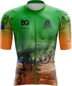 brightly colored green and orange cycle shirt with back pocket front view