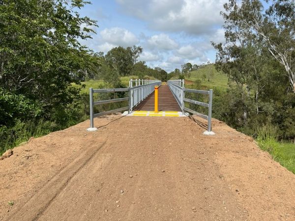 bridge across slab creek with new decking and railings